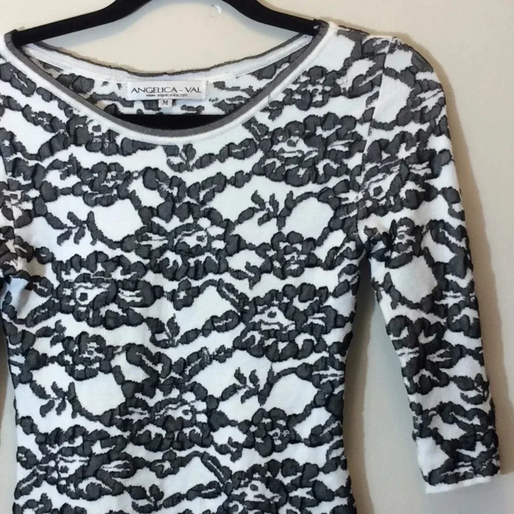 Angelica-Val Cream & Black Floral And Lace Top